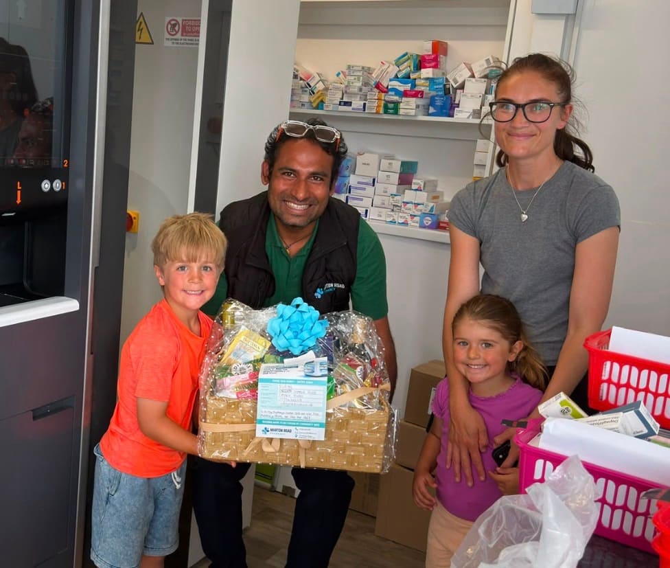 Charlie Rudd's family receives the luxury hamper after naming the robot Robyn