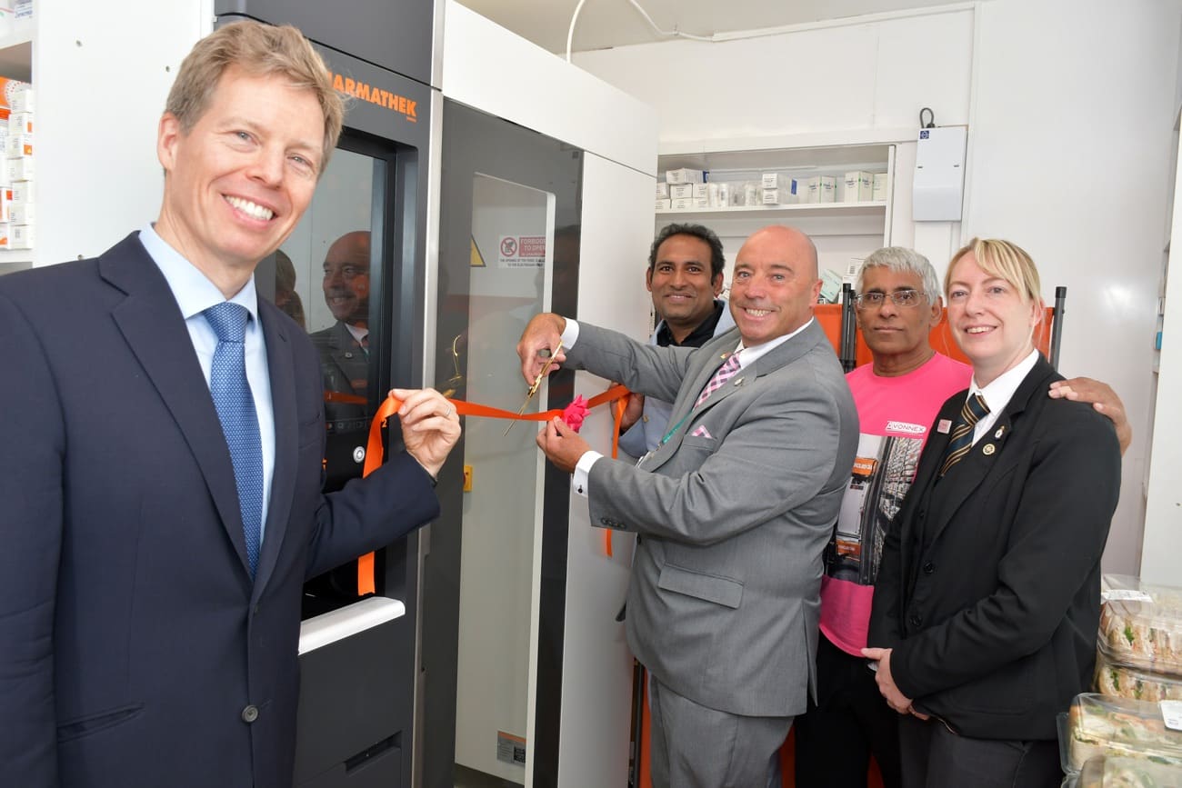 Cllr Liam Dealtry, Jaya Gaali and guests cut the ribbon on the Avonnex dispensing robot at Marton Road Pharmacy